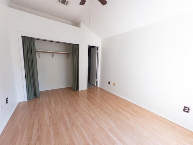 823 Topaz Ln, Leander, TX 78641 - unfurnished bedroom featuring vaulted ceiling, light wood-type flooring, a closet, and ceiling fan