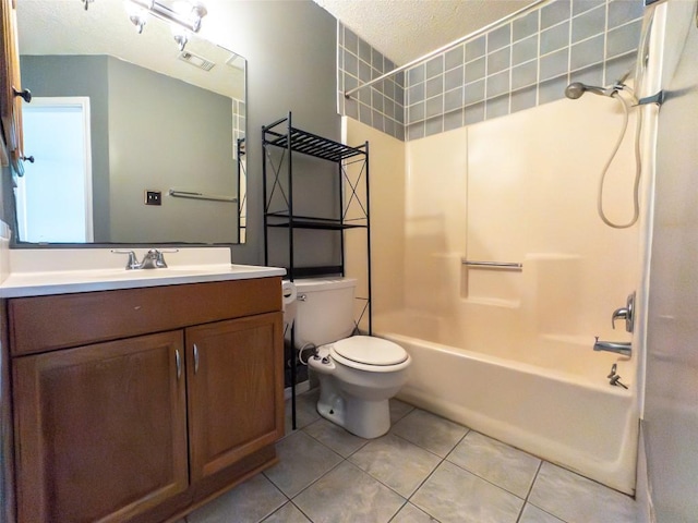 823 Topaz Ln, Leander, TX 78641 - full bathroom featuring tile patterned floors, bathing tub / shower combination, vanity, and a textured ceiling