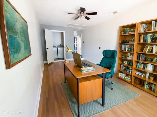 823 Topaz Ln, Leander, TX 78641 - home office with independent washer and dryer, wood finished floors, ceiling fan, and attic access