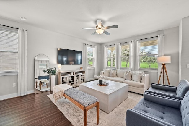 7506 Chesapeake Rail Ln, Austin, TX 78744 - living area featuring a ceiling fan and wood finished floors