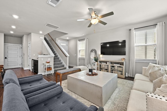 7506 Chesapeake Rail Ln, Austin, TX 78744 - living room with a ceiling fan, stairs, wood finished floors, and recessed lighting