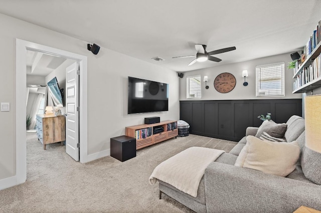 7506 Chesapeake Rail Ln, Austin, TX 78744 - living room with ceiling fan, healthy amount of natural light, and carpet flooring