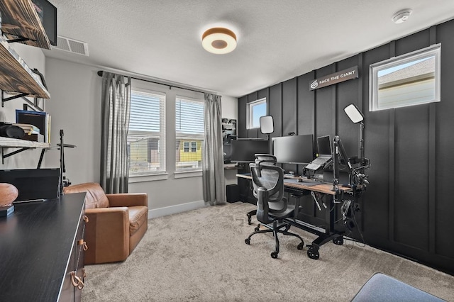 7506 Chesapeake Rail Ln, Austin, TX 78744 - home office with carpet floors and a textured ceiling