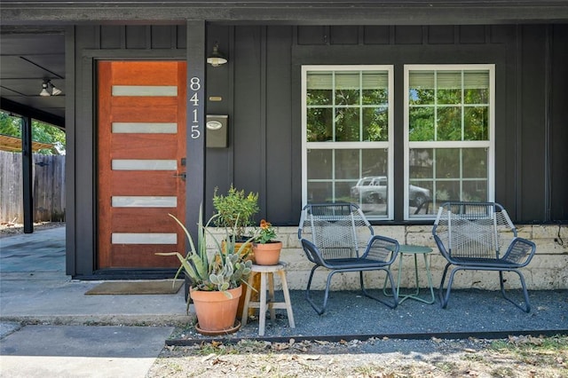 8415 Bowling Green Dr, Austin, TX 78757 - view of exterior entry featuring board and batten siding