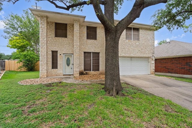 1708 Bengal Dr, Round Rock, TX 78664 - view of front of home featuring an attached garage, concrete driveway, and stone siding
