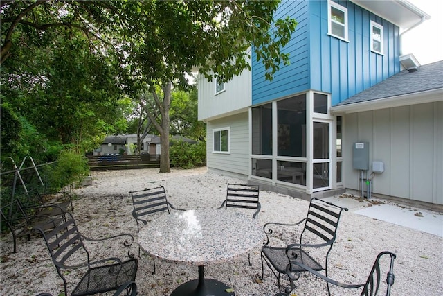 6613 Woodrow Ave, Austin, TX 78757 - view of patio with a sunroom and outdoor dining space