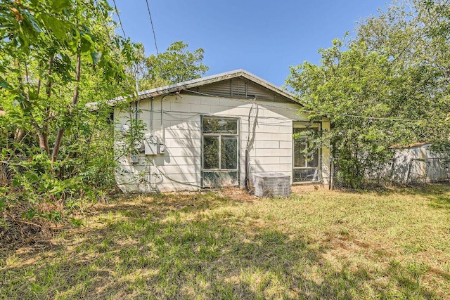1611 Suffolk Dr, Austin, TX 78723 - view of home's exterior with a yard