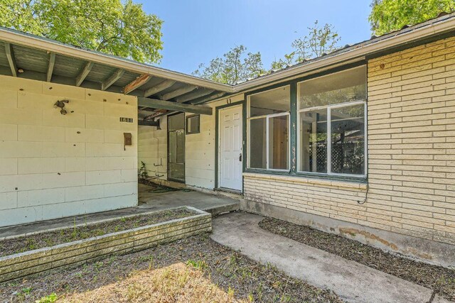 1611 Suffolk Dr, Austin, TX 78723 - property entrance with brick siding