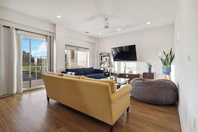 4361 S Congress Ave Unit 209, Austin, TX 78745 - living room featuring dark wood-style flooring, a ceiling fan, and recessed lighting