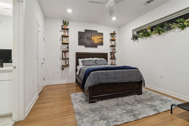 4361 S Congress Ave Unit 209, Austin, TX 78745 - bedroom featuring light wood-style floors, recessed lighting, and ceiling fan