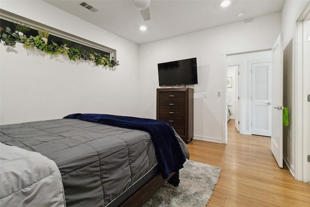 4361 S Congress Ave Unit 209, Austin, TX 78745 - bedroom featuring light wood-style floors, recessed lighting, and ceiling fan