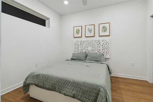 4361 S Congress Ave Unit 209, Austin, TX 78745 - bedroom with wood finished floors, recessed lighting, and ceiling fan