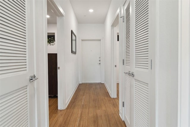 4361 S Congress Ave Unit 209, Austin, TX 78745 - corridor with light wood finished floors and recessed lighting