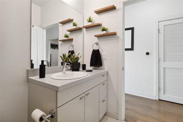 4361 S Congress Ave Unit 209, Austin, TX 78745 - bathroom with vanity and wood finished floors