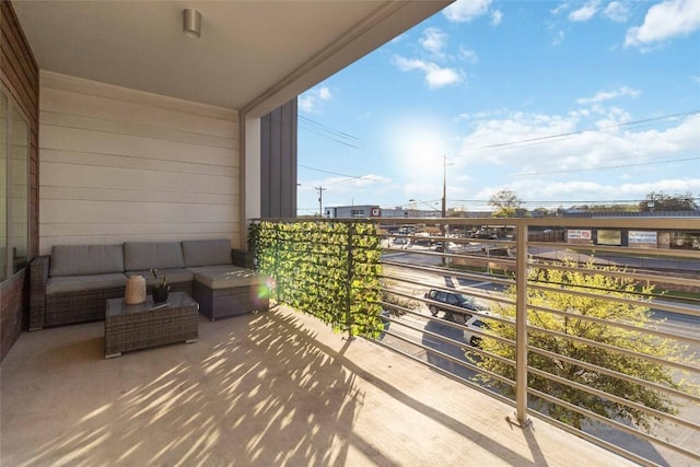 4361 S Congress Ave Unit 209, Austin, TX 78745 - balcony featuring outdoor lounge area