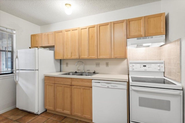 4405 Ave A Unit 5, Austin, TX 78751 - kitchen with white appliances, exhaust hood, light countertops, light brown cabinets, and a textured ceiling
