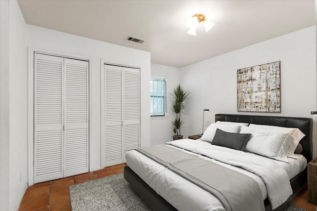4405 Ave A Unit 5, Austin, TX 78751 - tiled bedroom with multiple closets