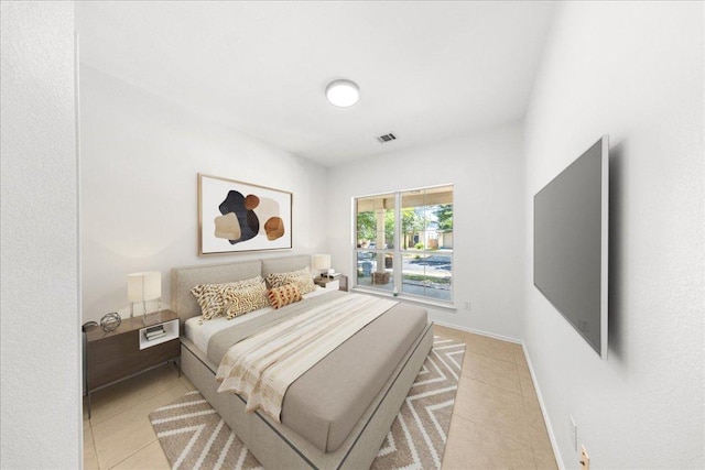 2306 Billy Fiske Ln, Austin, TX 78748 - bedroom with light tile patterned flooring and baseboards