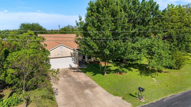 803 N Myrtle St, Georgetown, TX 78626 - view of front facade featuring concrete driveway, a front lawn, and a garage