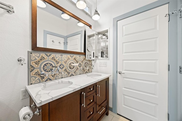 803 N Myrtle St, Georgetown, TX 78626 - bathroom with backsplash, double vanity, and tile patterned flooring