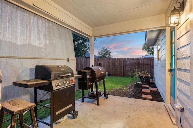 1220 Redstone Dr, Temple, TX 76502 - fenced backyard with area for grilling and a patio area