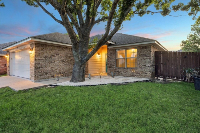 1220 Redstone Dr, Temple, TX 76502 - single story home with brick siding, an attached garage, and a shingled roof