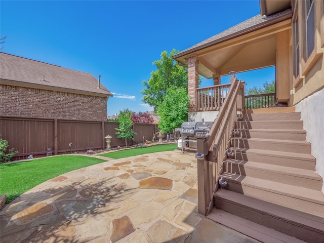 457 Monahans Dr, Georgetown, TX 78628 - fenced backyard with stairs and a patio area