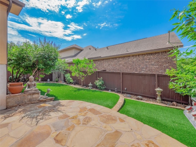 457 Monahans Dr, Georgetown, TX 78628 - fenced backyard featuring a patio