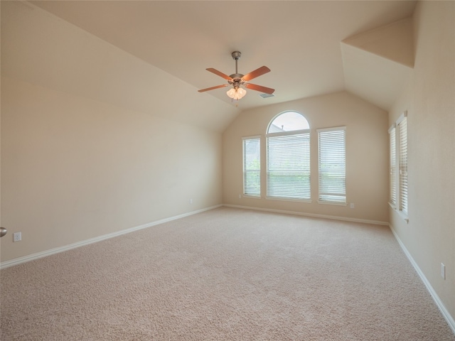 457 Monahans Dr, Georgetown, TX 78628 - empty room featuring ceiling fan, lofted ceiling, and light colored carpet