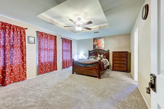6116 Speyside Dr, Austin, TX 78754 - carpeted bedroom featuring a raised ceiling, crown molding, and ceiling fan