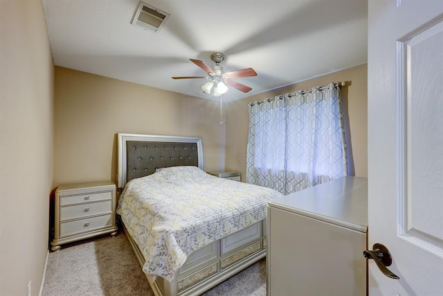 6116 Speyside Dr, Austin, TX 78754 - bedroom with dark carpet and a ceiling fan