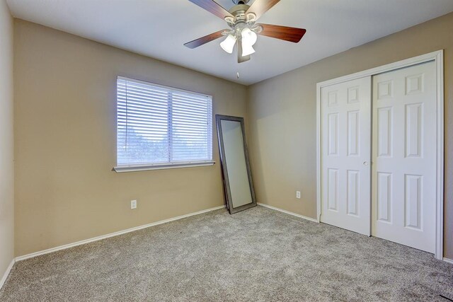 6116 Speyside Dr, Austin, TX 78754 - unfurnished bedroom with carpet, a closet, and ceiling fan