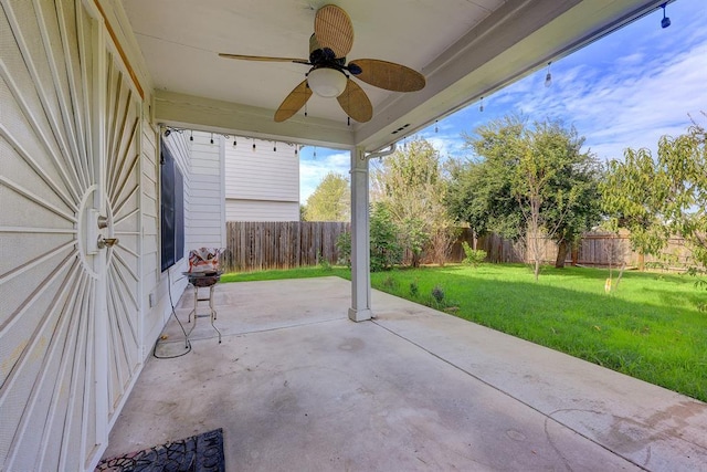 6116 Speyside Dr, Austin, TX 78754 - fenced backyard with a patio and a ceiling fan
