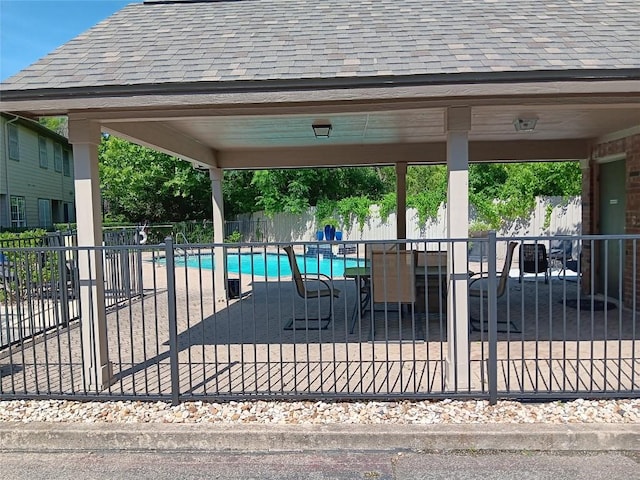 12401 Los Indios Trl Unit 9, Austin, TX 78729 - view of swimming pool featuring a fenced backyard and a patio
