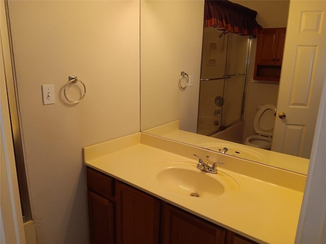 12401 Los Indios Trl Unit 9, Austin, TX 78729 - bathroom featuring vanity and enclosed tub / shower combo