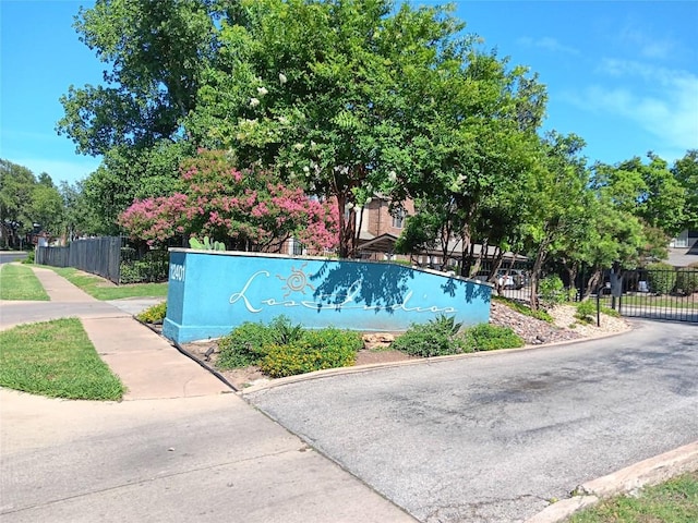 12401 Los Indios Trl Unit 9, Austin, TX 78729 - view of community sign
