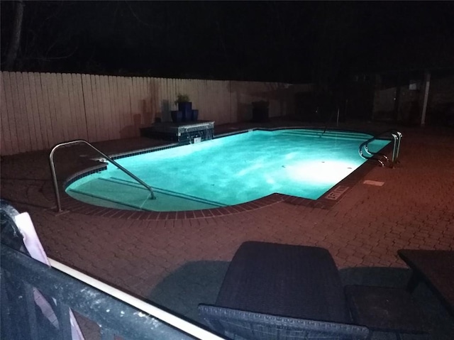 12401 Los Indios Trl Unit 9, Austin, TX 78729 - view of pool with a patio