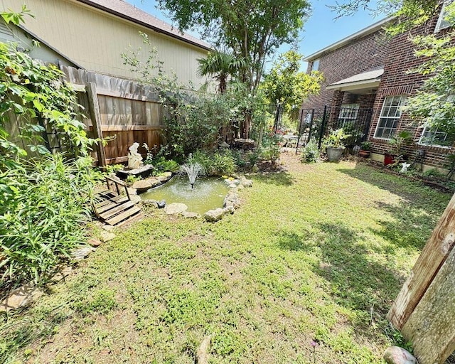 15304 Iola Cv, Austin, TX 78717 - view of yard with a small pond