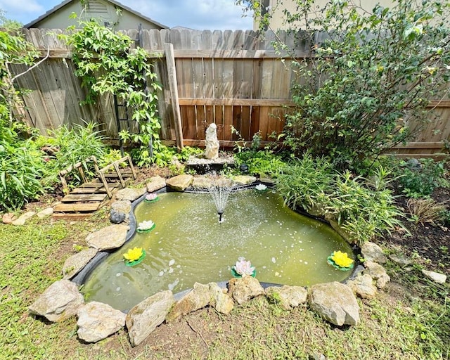 15304 Iola Cv, Austin, TX 78717 - view of yard with a garden pond