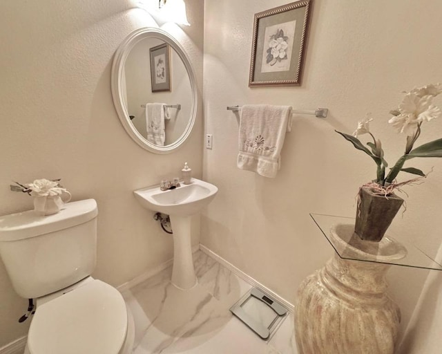 15304 Iola Cv, Austin, TX 78717 - bathroom featuring marble finish flooring and toilet