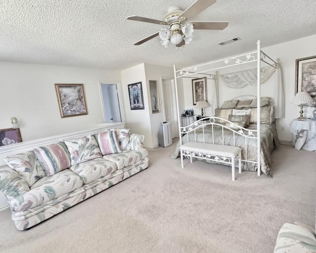 15304 Iola Cv, Austin, TX 78717 - carpeted bedroom featuring a textured ceiling and ceiling fan