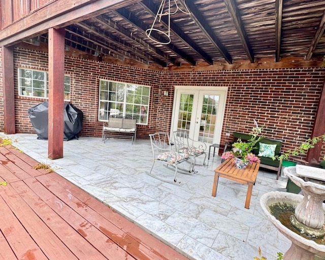 15304 Iola Cv, Austin, TX 78717 - deck with french doors, area for grilling, and a patio area
