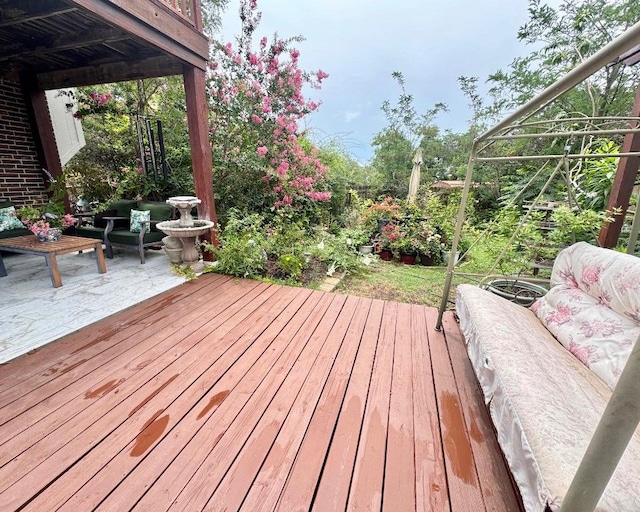 15304 Iola Cv, Austin, TX 78717 - wooden deck with outdoor lounge area and a patio
