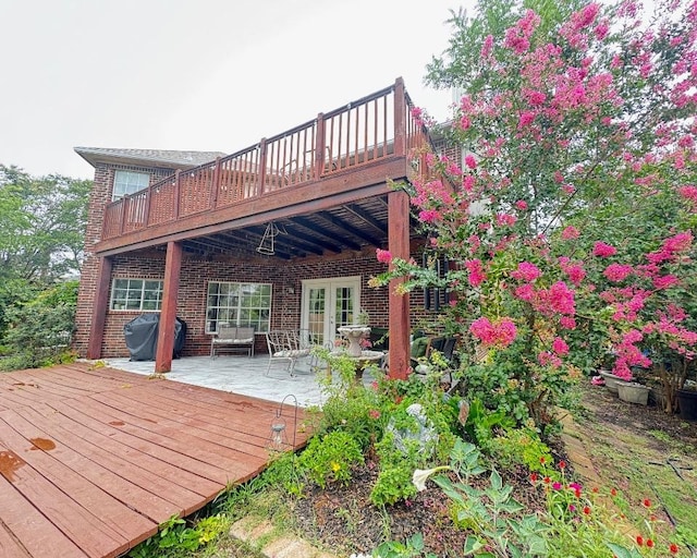15304 Iola Cv, Austin, TX 78717 - deck with grilling area, a patio area, and french doors