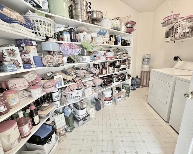 15304 Iola Cv, Austin, TX 78717 - laundry room featuring light flooring and washer and dryer