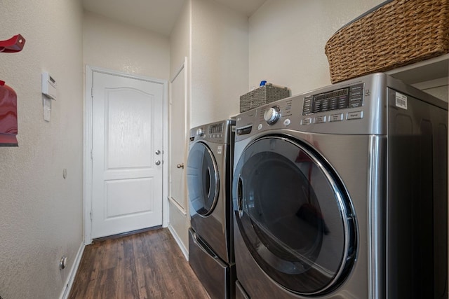 808 Lonesome Lilly Way, Pflugerville, TX 78660 - laundry area featuring independent washer and dryer, dark wood-style flooring, and a textured wall
