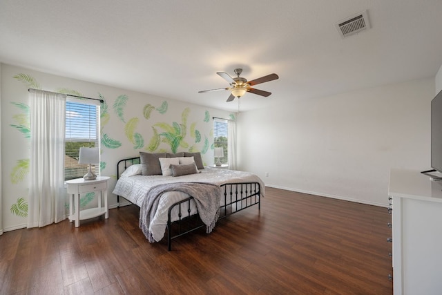 808 Lonesome Lilly Way, Pflugerville, TX 78660 - bedroom with wood finished floors and a ceiling fan