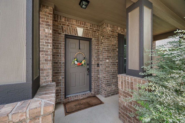 808 Lonesome Lilly Way, Pflugerville, TX 78660 - entrance to property featuring brick siding and a porch