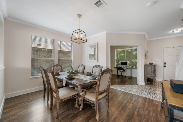 808 Lonesome Lilly Way, Pflugerville, TX 78660 - dining room with dark wood-style floors, crown molding, and a chandelier