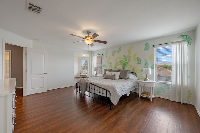 808 Lonesome Lilly Way, Pflugerville, TX 78660 - bedroom featuring dark wood-style flooring and a ceiling fan